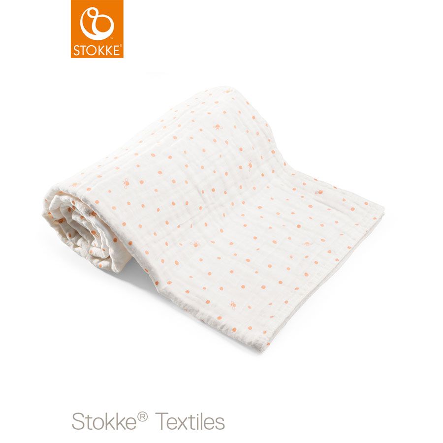 Stokke® pledd i muslinbomull, coral bee